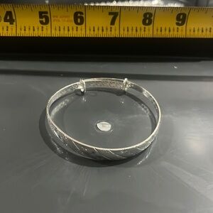 Silver coloured bracelet